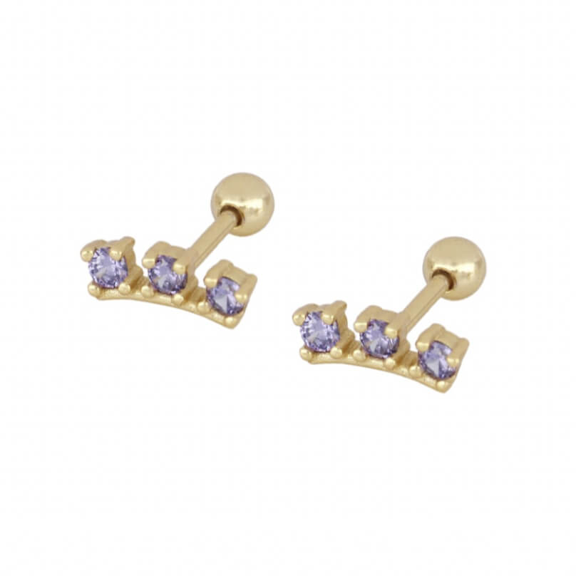 piercing dorado y morado